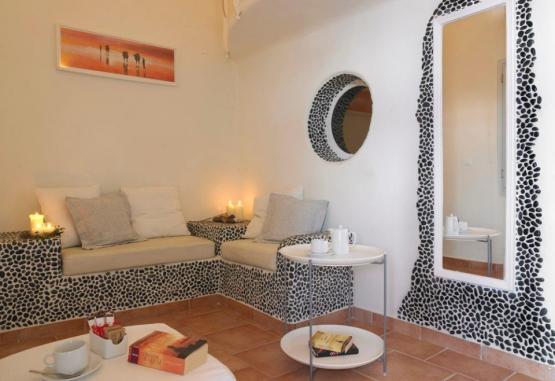 Suites of the Gods Cave Spa Hotel (Megalochori - Santorini)  Insula Santorini Grecia